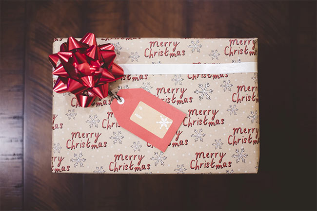 A Christmas present wrapped in vintage brown wrapping paper