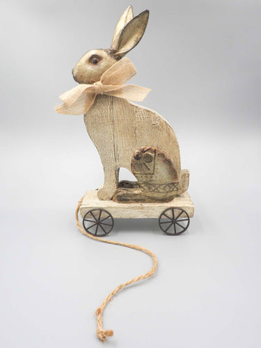 Vintage, wooden rabbit rustic Easter decor pull toy.