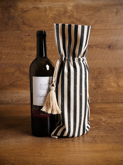 A unique Valentine's Day gift wine bottle and striped canvas wine gift bag